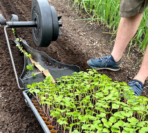 How heavy should a paperpot transplanter be?